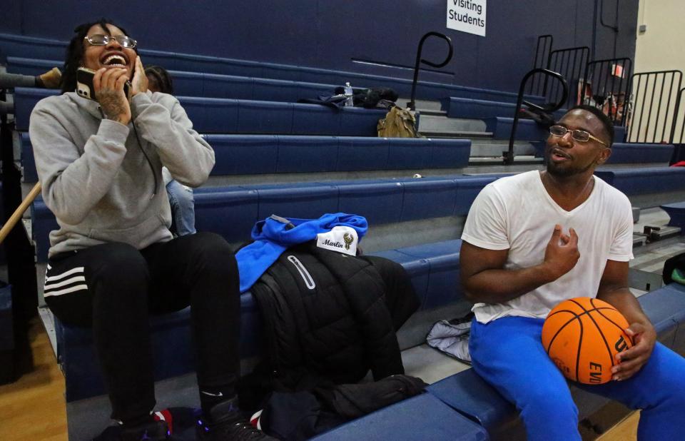 Kamariya Dixon, left, enjoys time with her father, Marlin Dixon, after playing basketball at Milwaukee Academy of Science. The two essentially didn't know each other until Marlin was released from prison, but they have tried to build a relationship. "I knew as long as I stayed alive this opportunity would happen, “ he said.