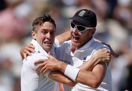 Britain Cricket - England v Pakistan - Third Test - Edgbaston - 7/8/16 England's Chris Woakes celebrates taking the wicket of Pakistan's Asad Shafiq with Stuart Broad Action Images via Reuters / Paul Childs