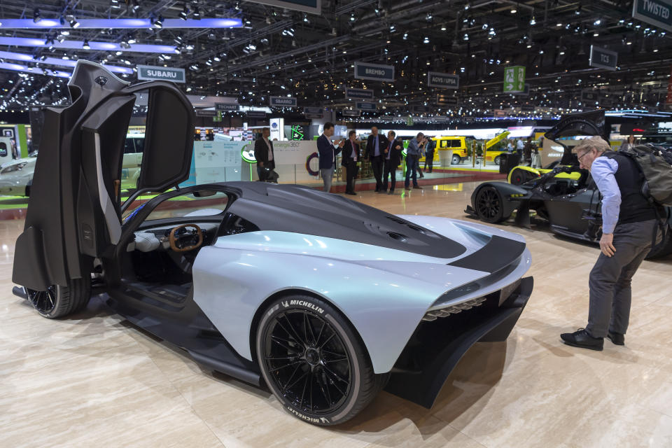 The new car Aston Martin AM-RB003 is presented during the press day at the 89th Geneva International Motor Show in Geneva, Switzerland, Wednesday, March 06, 2019. The Motor Show will open its gates to the public from March 7, presenting more than 180 exhibitors and more than 100 world and European premieres. (Martial Trezzini/Keystone via AP)