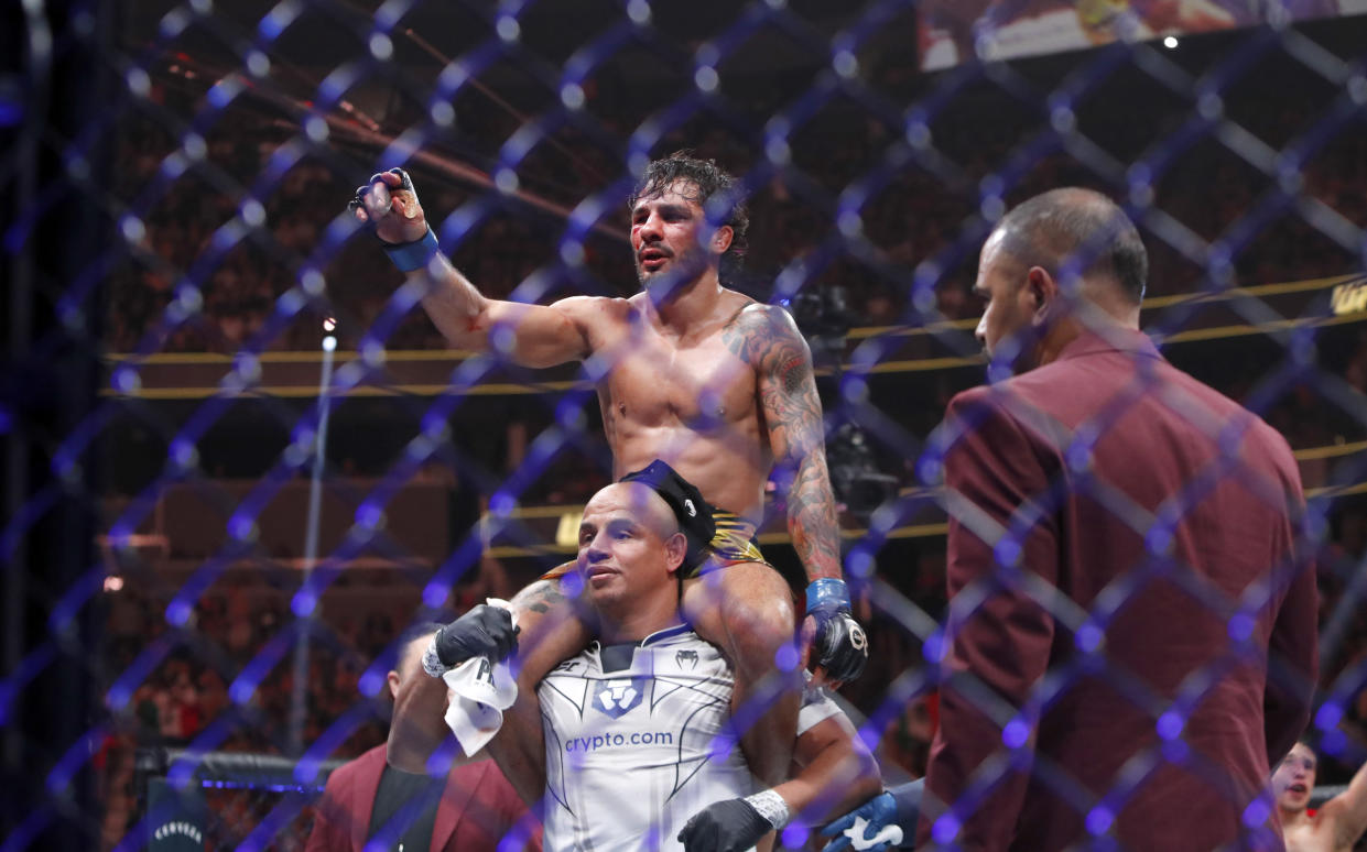 LAS VEGAS, NEVADA - JULY 08: Alexandre Pantoja celebrates after going five rounds against UFC flyweight champion Brandon Moreno during UFC 290 at T-Mobile Arena on July 08, 2023 in Las Vegas, Nevada. Pantoja won the title by split decision. (Photo by Steve Marcus/Getty Images)