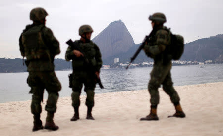 Brazilian Navy soldiers attend an exercise on Flamengo beach ahead of the 2016 Rio Olympics in Rio de Janeiro, Brazil, July 19, 2016. REUTERS/Ueslei Marcelino