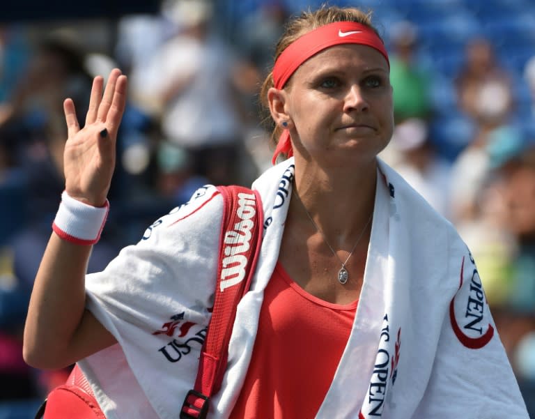 Lucie Safarova of the Czech Republic reacts after her loss to Lesia Tsurenko of Ukraine during their women's singles US Open match on September 1, 2015 in New York
