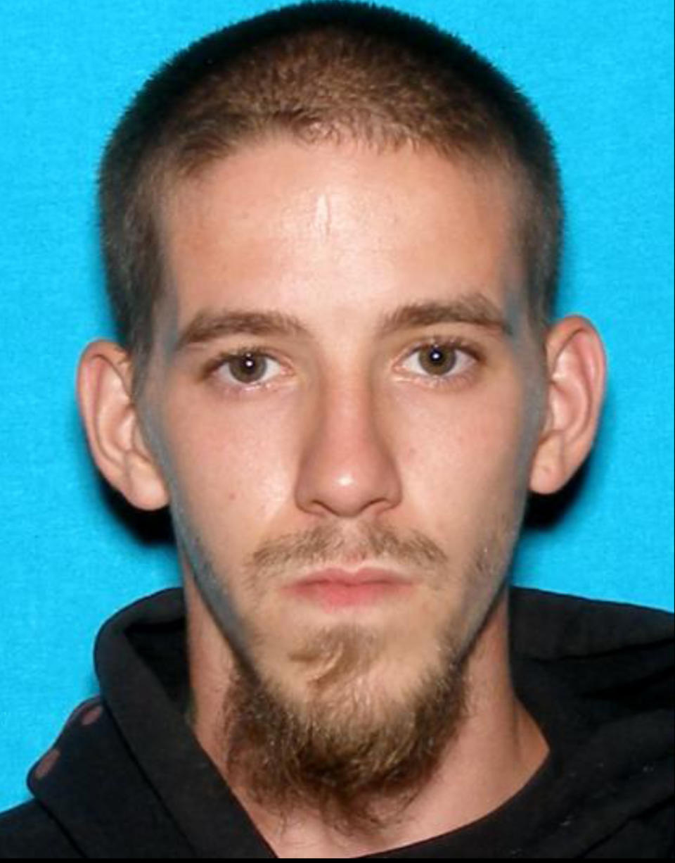 In this photo provided by Elkhart, Ind., Police is Shawn Walter Bair, 22, of Elkhart, Ind. Police identified Blair Thursday, Jan 16, 2014 as the man who fatally shot two women in a northern Indiana grocery store on Wednesday. Police said he was waving a gun at a kneeling store manager when they arrived: he turned toward the officers, who shot him as the manager escaped. (AP Photo/ Elkhart Police)