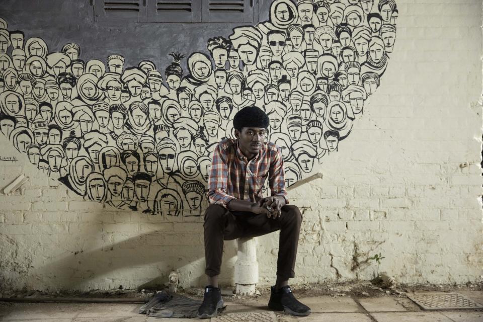 In this Jan. 10, 2020 photo, Sudanese activist, 21-year-old Wadah Ahmed, poses for a photograph, at the Revolutionary Martyrs Center, in Khartoum, Sudan. The young protesters who led the uprising against former President Omar al-Bashir say they've lost trust in the generals leading the country after a brutal crackdown on their sit-in last summer by security forces that killed dozens. The generals have shown little willingness to hand over power to a civilian-led administration, one the demonstrators' key demands. (AP Photo/Nariman El-Mofty)