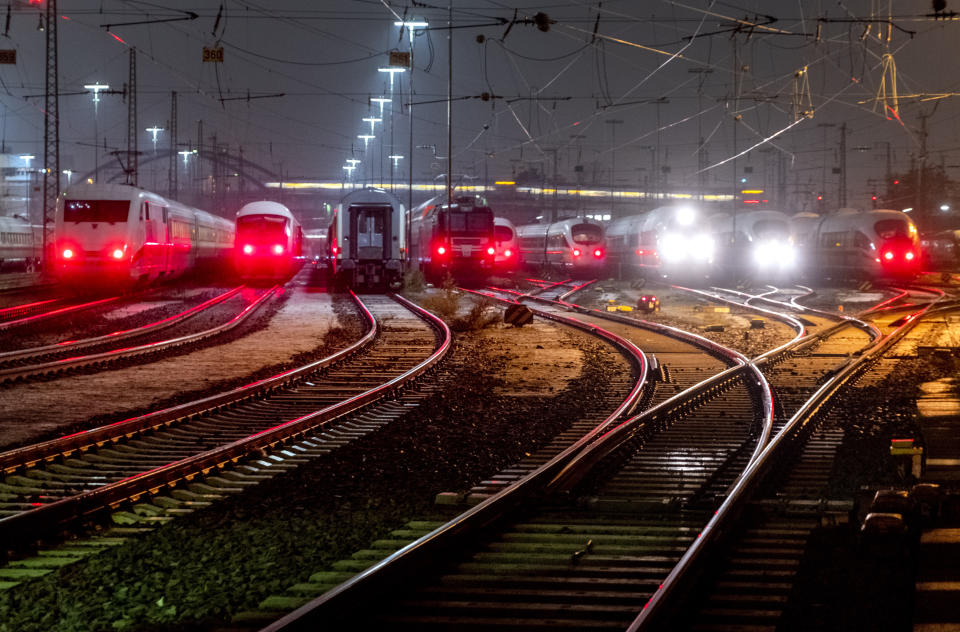 Trains are parked outside the central train station in Frankfurt, Germany, Friday, Dec. 8, 2023, when train drivers of the GDL union went on a 24-hour-strike. (AP Photo/Michael Probst)