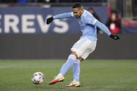 New York City FC defender Alexander Callens strikes his game-winning penalty kick against the New England Revolution during an MLS playoff soccer match Tuesday, Nov. 30, 2021, in Foxborough, Mass. New York City won 3-2. (AP Photo/Charles Krupa)