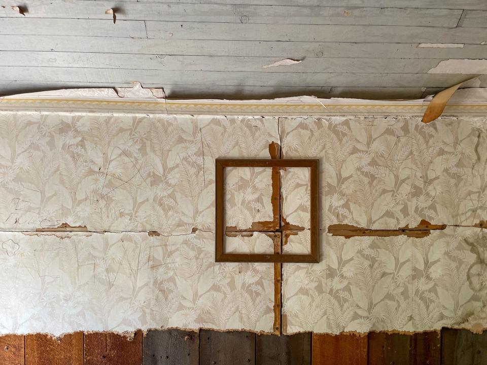 An empty picture frame in an abandoned building near Telluride, Colorado.