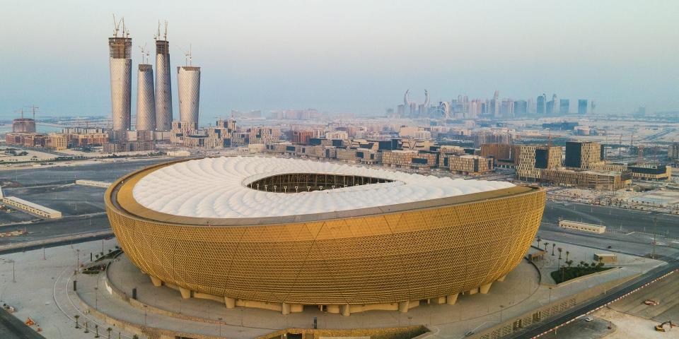 An aerial view of Lusail Stadium at sunset in Doha, Qatar.