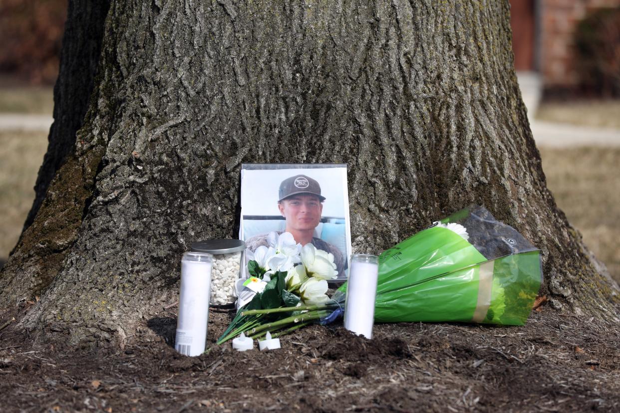 A makeshift memorial for Stone J. Foltz, 20, of Delaware, outside of Pi Kappa Alpha at Bowling Green State University. Foltz died March 7, 2021 three days after an off-campus hazing incident.