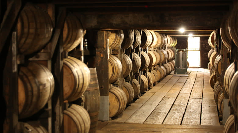 Rows of barrels in a bourbon barrel house