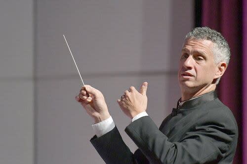 Robert Franz, 55, conducting for the Windsor Symphony Orchestra. Franz made a full recovery from non-Hodgkin's lymphoma. 