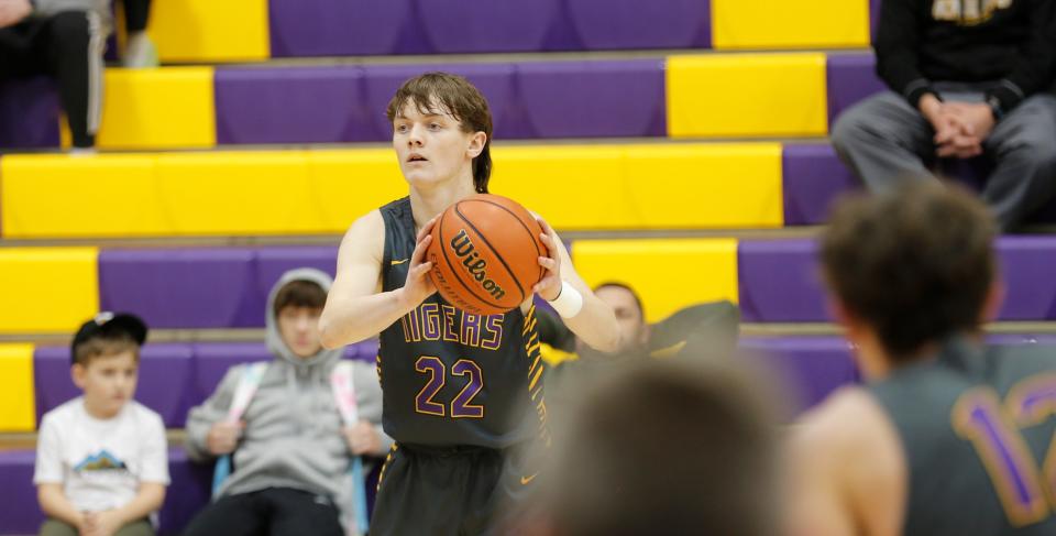 Hagerstown senior Mason Romack looks for an open teammate during a Wayne County Tournament game against Lincoln Jan. 5, 2023.