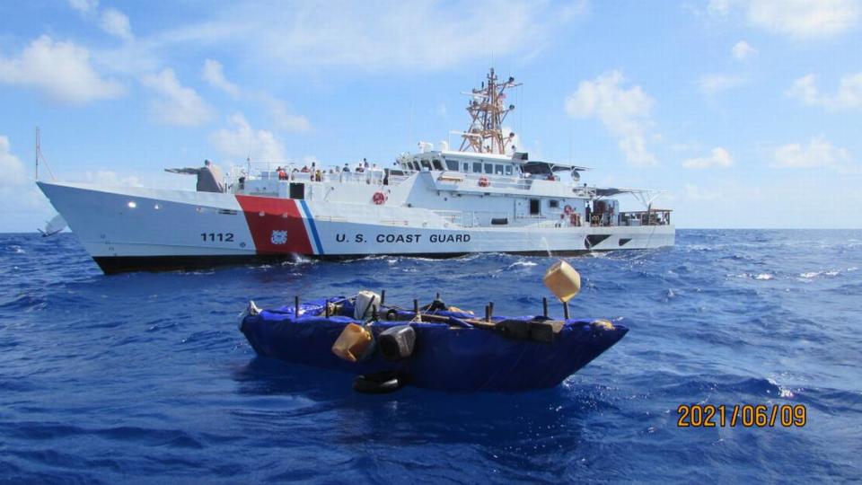 A rustic boat used by Cuban migrants to try to reach South Florida floats in front of the Coast Guard Cutter Isaac Mayo, 27 miles south of Long Key on Wednesday, June 9, 2021. A law enforcement team from the cutter interdicted 16 Cuban migrants from the craft.