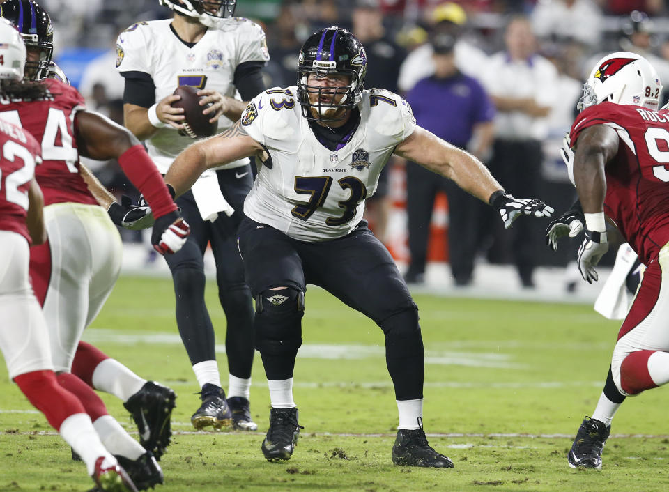 FILE - In this Oct. 26, 2015, file photo, Baltimore Ravens guard Marshal Yanda (73) blocks during an NFL football game against the Arizona Cardinals, in Glendale, Ariz. Yanda is retiring after 13 seasons in which he was named to the Pro Bowl eight times and helped Baltimore win the 2012 Super Bowl. (AP Photo/Rick Scuteri, File)