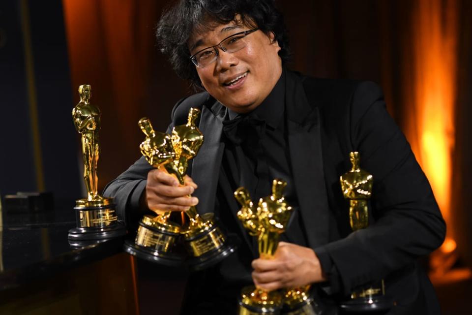 <div class="inline-image__caption"><p>South Korean film director Bong Joon-ho posed with his engraved awards for his hit film “Parasite” at the 92nd Oscars Governors Ball at the Hollywood & Highland Center in Hollywood, California on February 9, 2020.</p></div> <div class="inline-image__credit">Valerie Macon/Getty</div>