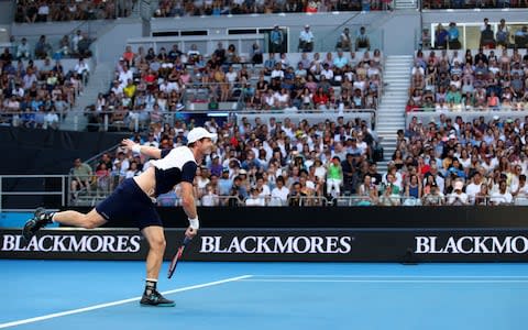 Andy Murray of Great Britain serves in his first round match against Roberto Bautista Agut of Spain during day one of the 2019 Australian Open at Melbourne Park on January 14, 2019 in Melbourne, Australia - Credit: Getty Images