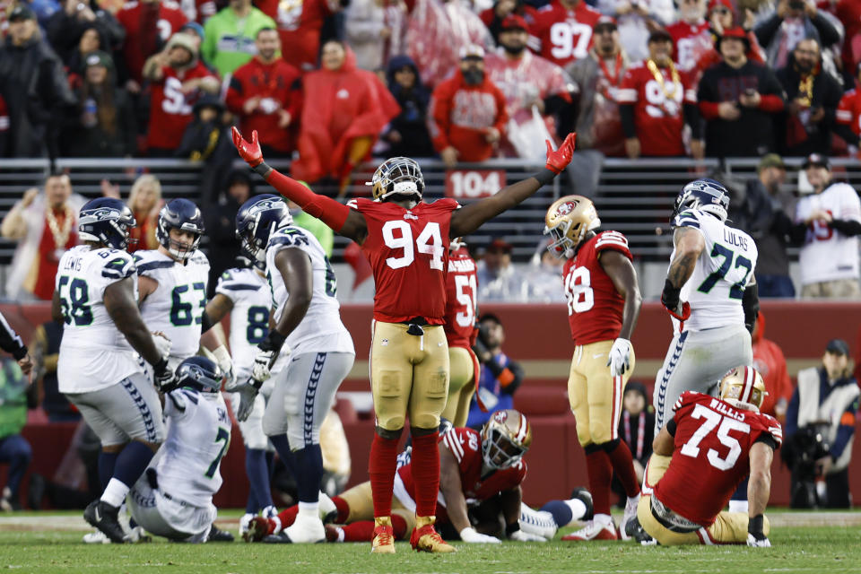 San Francisco 49ers defensive end Charles Omenihu (94) celebrates during the second half of an NFL wild card playoff football game against the Seattle Seahawks in Santa Clara, Calif., Saturday, Jan. 14, 2023. The 49ers won 41-23. (AP Photo/Jed Jacobsohn)