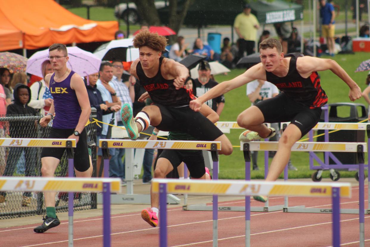 Jayden Goings (left) and Braydon Martin (right) in 2023. They run side-by-side each other in last year's 110 hurdles final at the Ohio Cardinal Conference track meet at Ashland University.