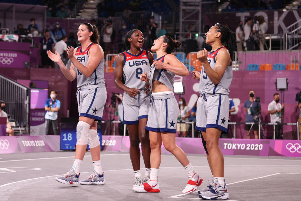 Stefanie Dolson, Jacquelyn Young, Kelsey Plum and Allisha Gray of Team USA celebrate victory and winning the gold medal in the 3x3 Basketball competition at the Tokyo 2020 Olympic Games at Aomi Urban Sports Park on July 28, 2021 in Tokyo, Japan.<span class="copyright">Christian Petersen—Getty Images</span>