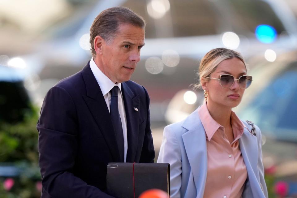 Hunter Biden and wife Melissa Cohen Biden are seen entering federal court in Wilmington, Delaware.