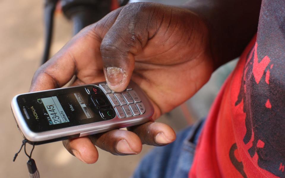 Mobile devices are becoming ubiquitous in Africa. <a href="https://www.gettyimages.com/detail/news-photo/mobile-phone-lome-togo-news-photo/170481943" rel="nofollow noopener" target="_blank" data-ylk="slk:Godong/Universal Images Group via Getty Images;elm:context_link;itc:0;sec:content-canvas" class="link ">Godong/Universal Images Group via Getty Images</a>