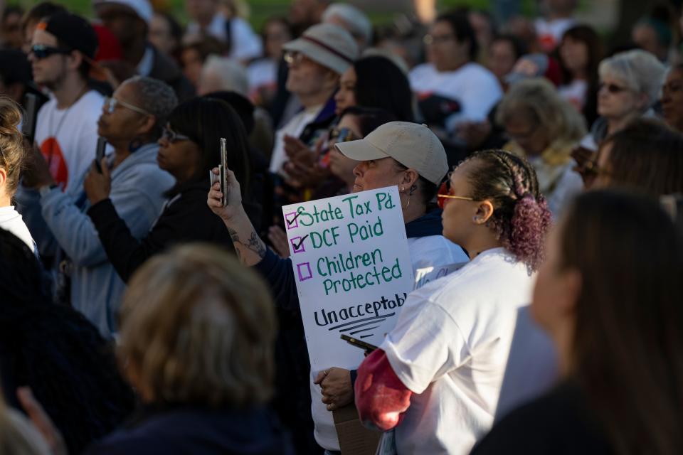 Protestors gather to March 4 Zoey Saturday after they walked from downtown Topeka to the Kansas Statehouse.