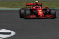 <p>Ferrari's Monegasque driver Charles Leclerc steers his car during the qualifying session for the Formula One British Grand Prix at the Silverstone motor racing circuit in Silverstone, central England on August 1, 2020</p>