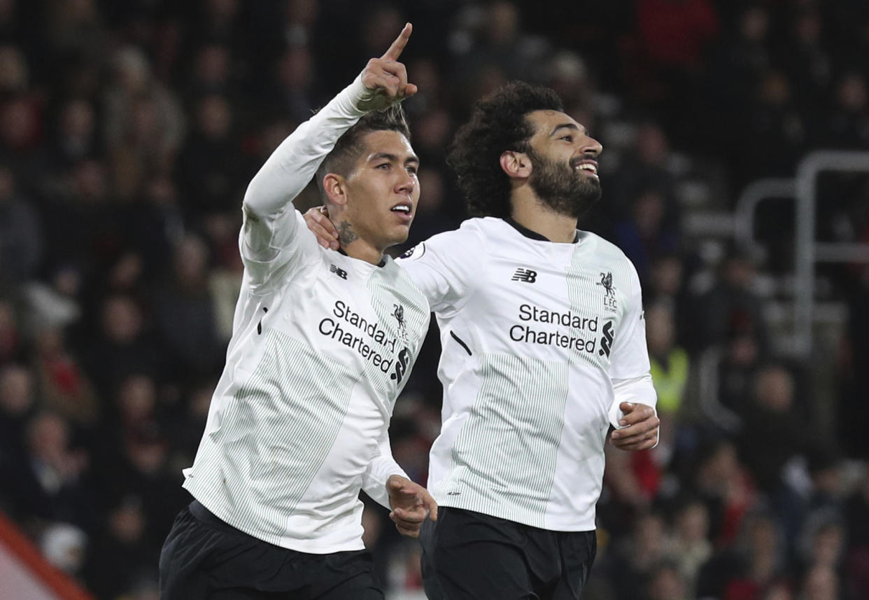 Roberto Firmino struck and Mohamed Salah got his 20th goal of the season as Liverpool beat Bournemouth 4-0.