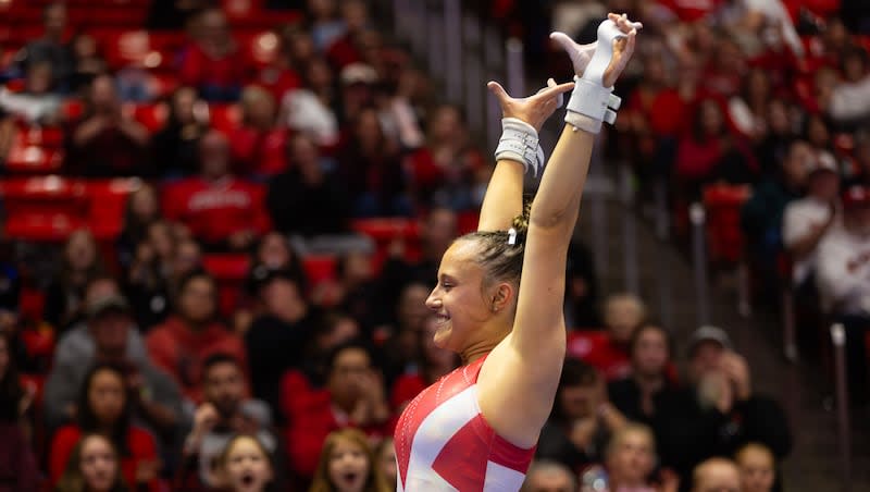 Ella Zirbes sticks the landing after her bar routine during the Red Rocks Preview at the Huntsman Center in Salt Lake City on Friday, Dec. 15, 2023. Zirbes is one of three freshmen who have become key contributors this season and likely hold the key to the Red Rocks success in the postseason.