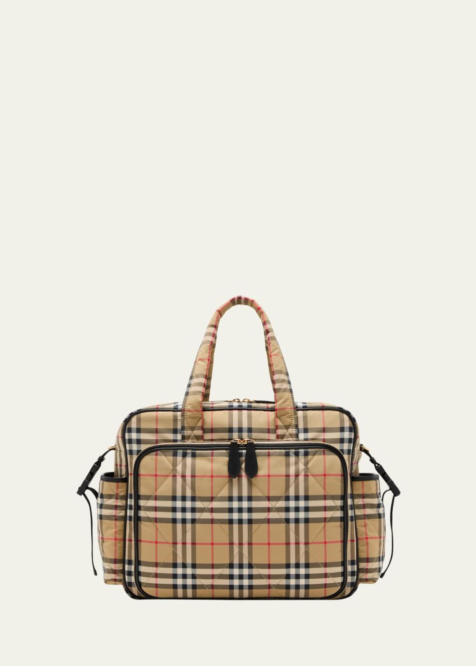 <p><a href="https://go.redirectingat.com?id=74968X1596630&url=https%3A%2F%2Fwww.bergdorfgoodman.com%2Fp%2Fburberry-check-print-diaper-bag-w-changing-mat-prod180720022&sref=https%3A%2F%2Fwww.harpersbazaar.com%2Ffashion%2Fg35322578%2Fbest-designer-diaper-bags%2F" rel="nofollow noopener" target="_blank" data-ylk="slk:Shop Now;elm:context_link;itc:0;sec:content-canvas" class="link ">Shop Now</a></p><p>Check-Print Diaper Bag W/ Changing Mat</p><p>bergdorfgoodman.com</p><p>$1390.00</p><span class="copyright">bergdorfgoodman.com</span>