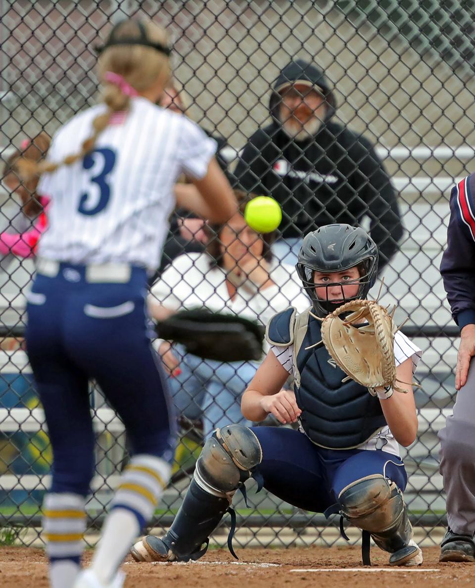 Tallmadge catcher Lexi Gray eyes down a pitch from Riley Jackson against Kent Roosevelt on April 10 in Tallmadge.