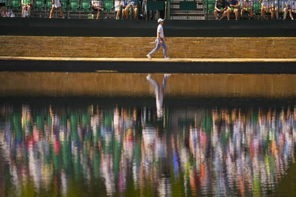 Min Woo Lee, of Australia, walks to the green on the 15th hole during a practice round for the Masters golf tournament at Augusta National Golf Club, Wednesday, April 5, 2023, in Augusta, Ga. (AP Photo/Mark Baker)