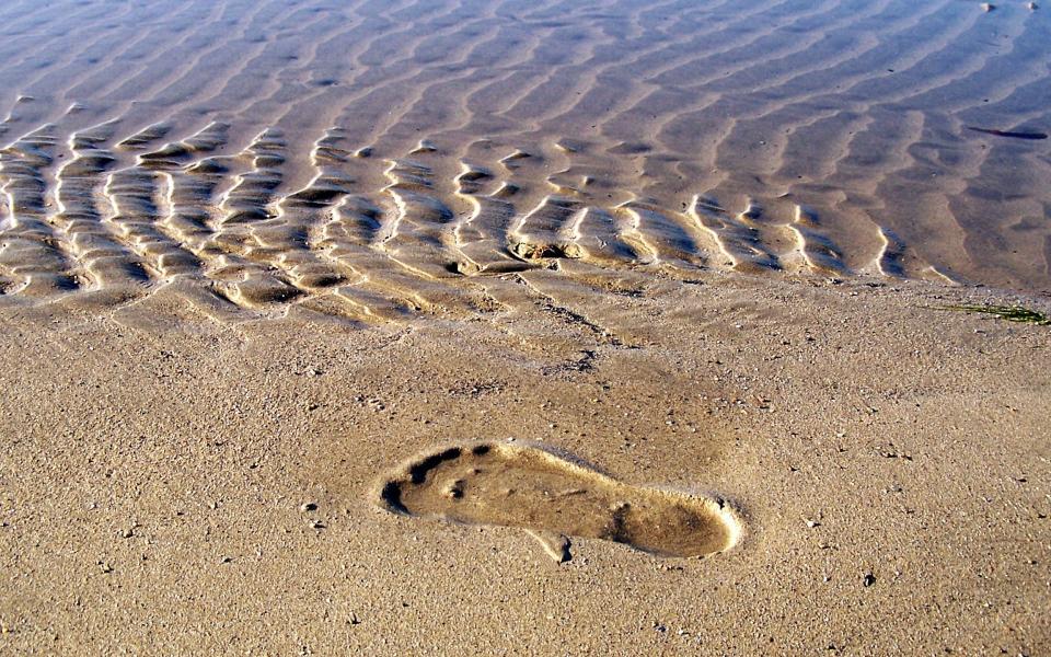 Leaving a mark: a footprint on the sand at St Ives, a popular Cornish tourist destination -  Sergiusz Pawlowski/ EyeEm