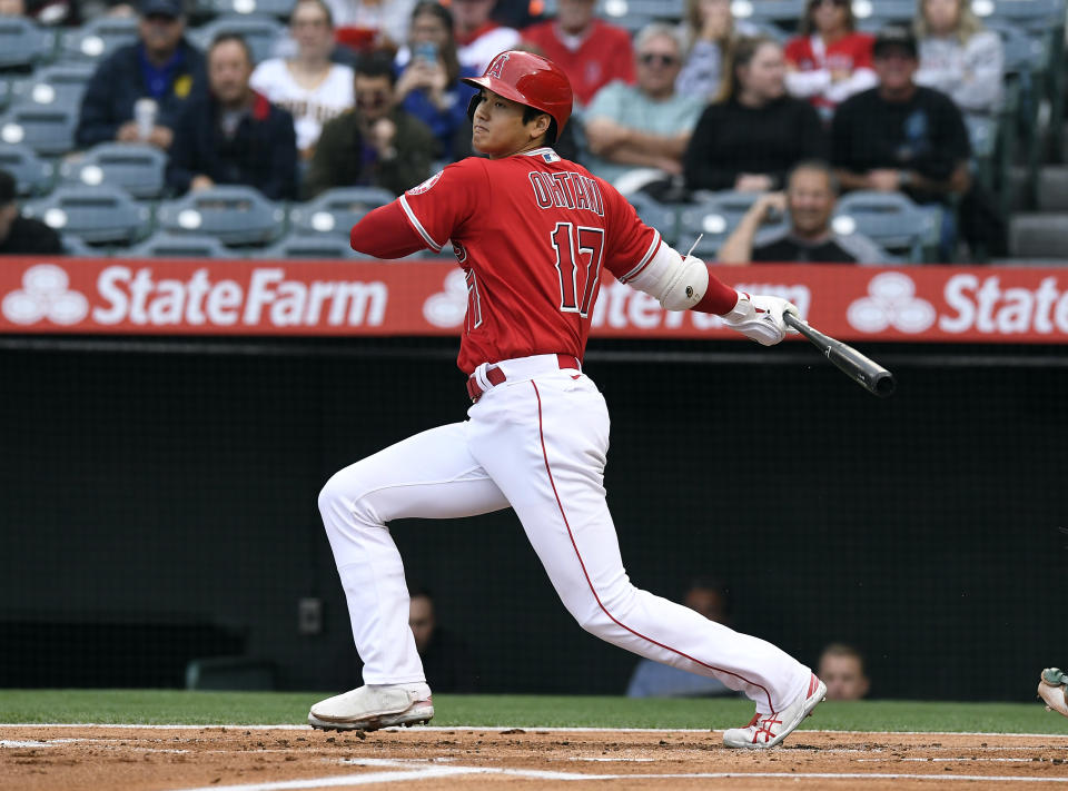 ANAHEIM, CA - MAY 21: Shohei Ohtani #17 of the Los Angeles Angels hits a lead off base hit against starting pitcher Frankie Montas #47 of the Oakland Athletics during the first inning at Angel Stadium of Anaheim on May 21, 2022 in Anaheim, California. (Photo by Kevork Djansezian/Getty Images)