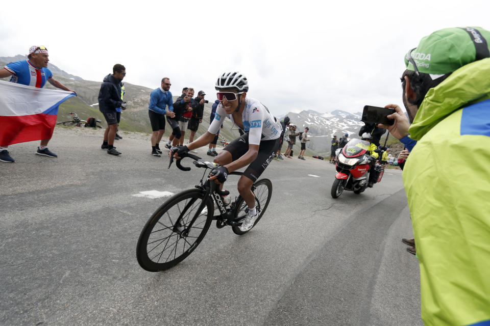 Colombia's Egan Bernal wearing the best young rider's white jersey climbs Iseran pass during the nineteenth stage of the Tour de France cycling race over 126,5 kilometers (78,60 miles) with start in Saint Jean De Maurienne and finish in Tignes, France, Friday, July 26, 2019. Tour de France organizers stopped Stage 19 of the race because of a hail storm as Julien Alaphilippe lost his yellow jersey to Egan Bernal. (AP Photo/Thibault Camus)