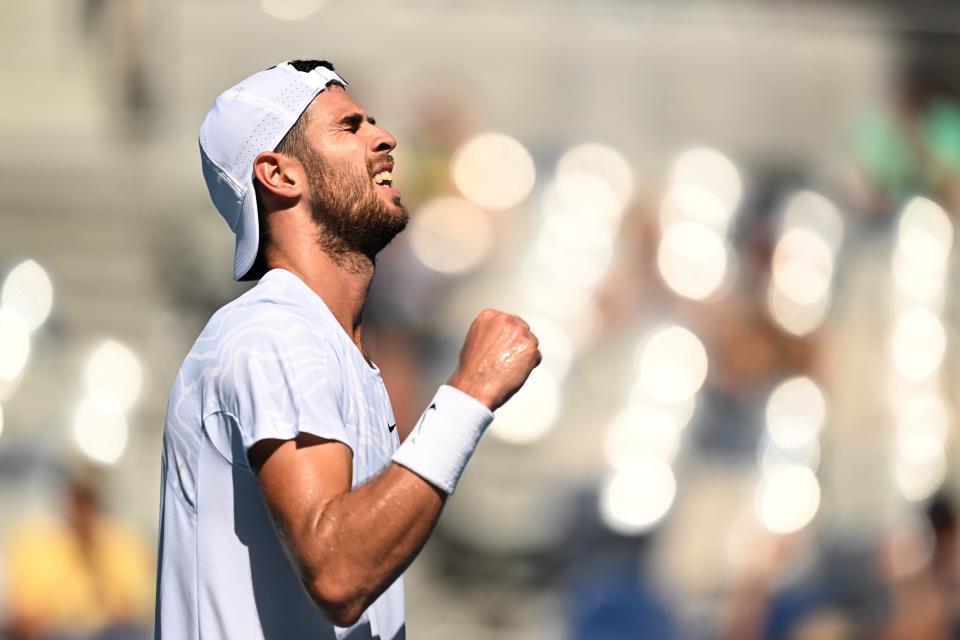 Karen Khachanov of Russia reacts during his 4th round match against Yoshihito Nishioka (EPA)