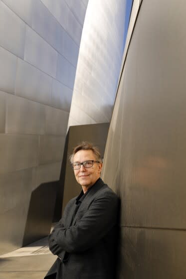 Los Angeles, California-Los Angeles Master Chorale artistic director, Grant Gershon, has led the choir for 20 years. He transformed a largely conservative choir into one of the country's most admired and adventurous groups. Photographed at Walt Disney Concert Hall on March 14, 2022. (Carolyn Cole / Los Angeles Times)