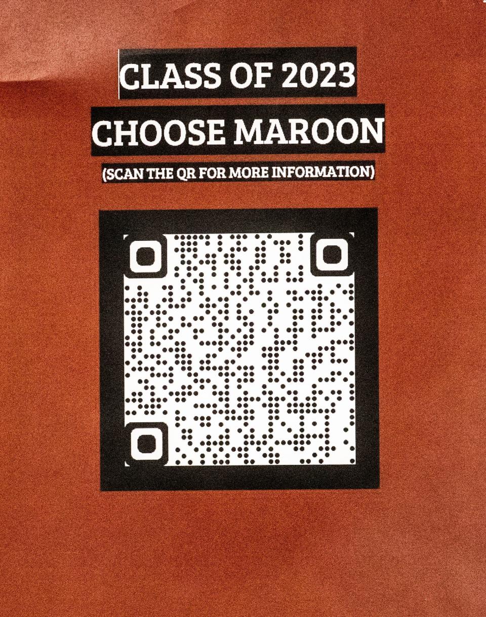 A QR code and sign encouraging the Class of 2023 to choose a single color for their graduation gown is featured at Concord High School in Brandywine Hundred on Wednesday, May 3, 2023. SLGTBQIA+ students have been advocating for the school to switch from a gendered gown color to a single color gown to stop the bullying of trans and non-binary students. 
