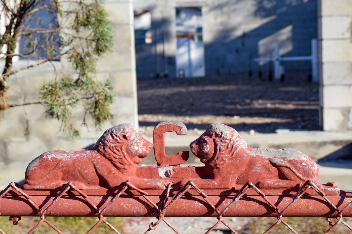 Two lions sit on either of the letter C on the gate in front of the Clearwater house Wade Clark’s father built for Clark’s grandmother. Wade Clark lost the property, which had been his home, after the city foreclosed on the property over unpaid code enforcement fines.