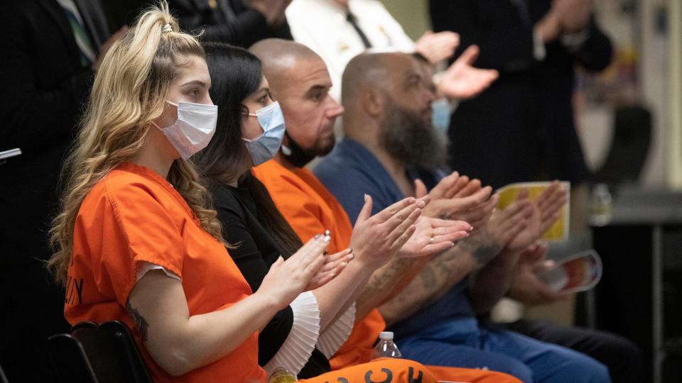 Round table participants applaud Dr. Rahul Gupta, the drug czar for the Biden Administration, after Dr. Gupta spoke on the  opioid crisis during a visit to the Camden County Correctional Facility in Camden on Tuesday, February 21, 2023.  