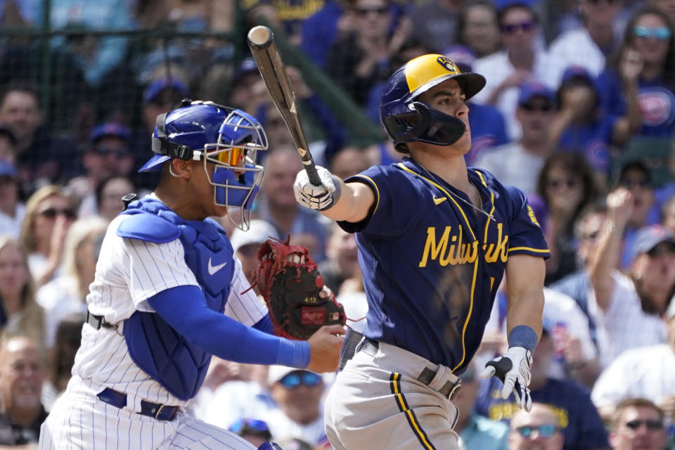 Milwaukee Brewers' Sal Frelick strikes out on a pitch from Chicago Cubs starter Kyle Hendricks, stranding two base runners, as catcher Miguel Amaya reacts during the fifth inning of a baseball game Wednesday, Aug. 30, 2023, in Chicago. (AP Photo/Charles Rex Arbogast)