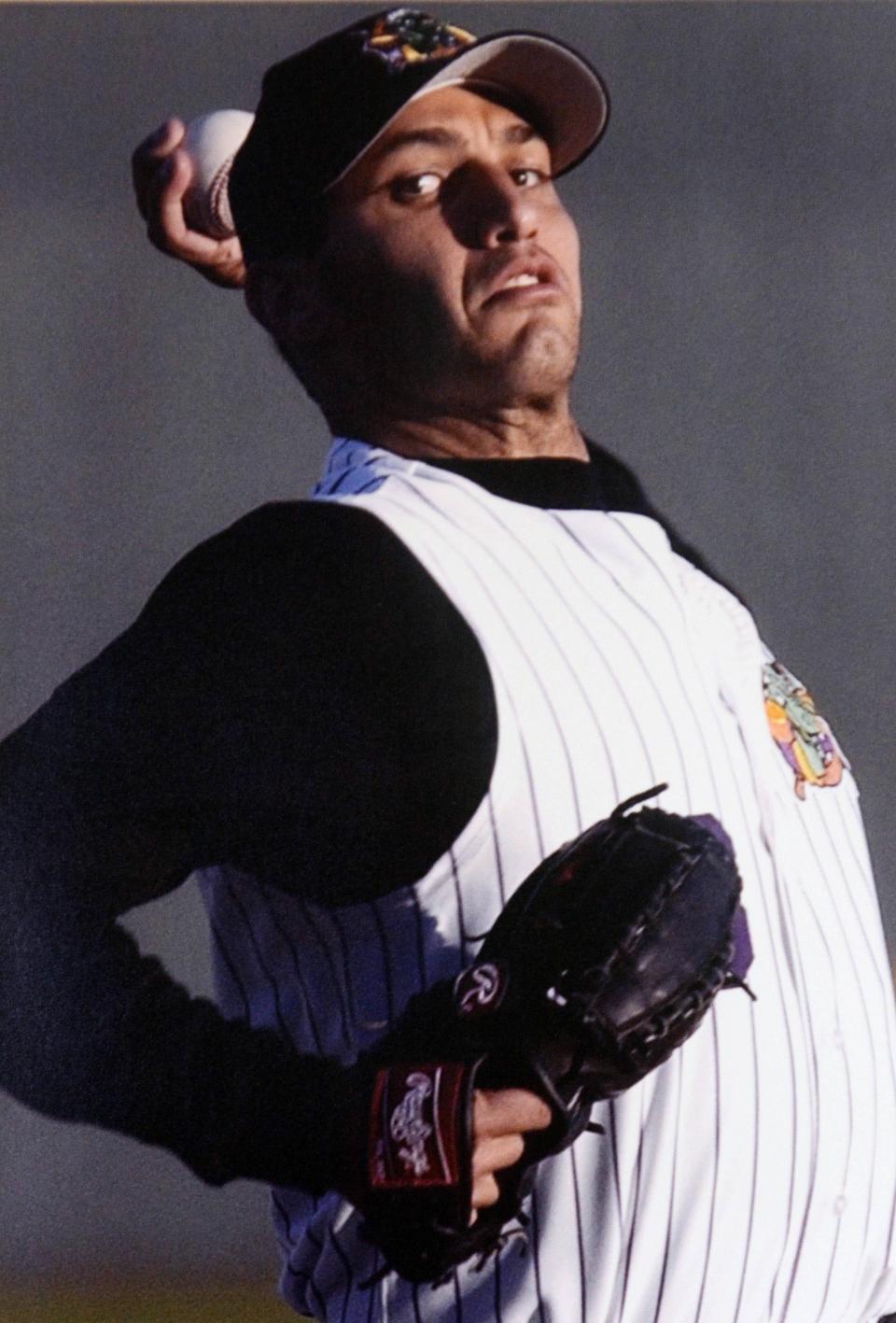 New York Yankees pitcher Andy Pettitte, wearing a Norwich Navigators cap, throws during a rehab assignment at Dodd Stadium in Norwich June 8, 2002. 