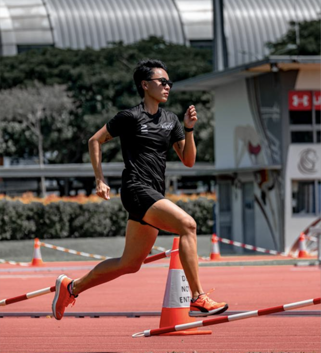 Premium Photo  African american female athlete feels happy after running long  distance on track at sports ground