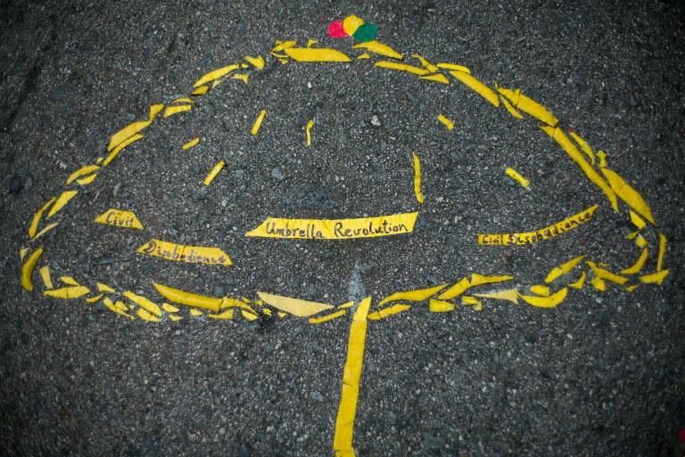 Artwork of a yellow umbrella by retiree Alexandra Wong, 60, outside government headquarters in Hong Kong