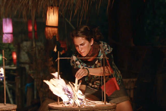 <p>CBS/Getty</p> Aubry Bracco competes in the fire-making challenge at Tribal Council during the finale episode of 'Survivor: Kaoh Rong.