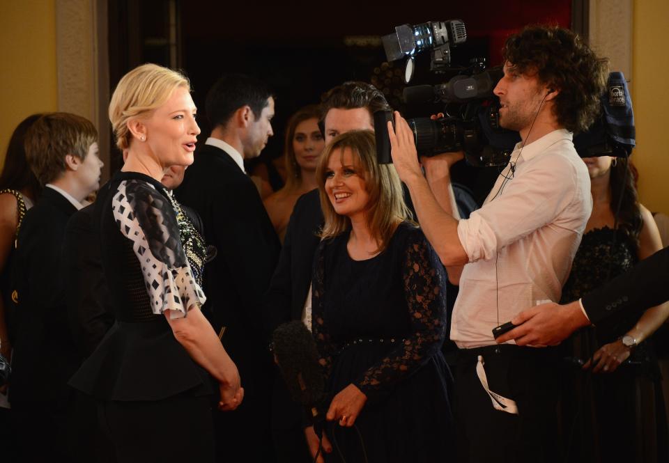 DUBAI, UNITED ARAB EMIRATES - DECEMBER 10: Actress Cate Blanchett speaks to the media as she attends the Dubai International Film Festival and IWC Schaffhausen Filmmaker Award Gala Dinner and Ceremony at the One and Only Mirage Hotel on December 10, 2012 in Dubai, United Arab Emirates. (Photo by Andrew H. Walker/Getty Images for DIFF)