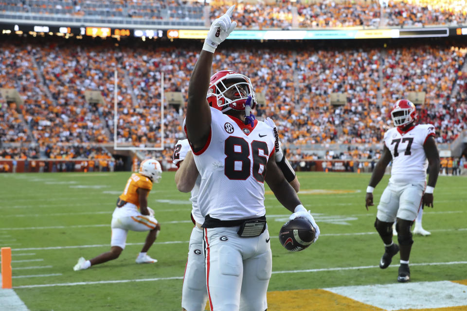 Georgia wide receiver Dillon Bell celebrates scoring a touchdown during the second quarter of an NCAA college football game against Tennessee, Saturday, Nov. 18, 2023, in Knoxville, Tenn. (Curtis Compton/Atlanta Journal-Constitution via AP)