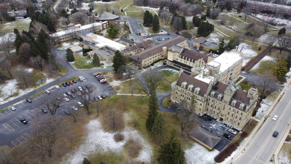 This aerial image taken with a drone shows the School Sisters of Notre Dame Central Pacific Province, Thursday, Dec. 17, 2020, in Elm Grove, Wis. Eight nuns living in the suburban Milwaukee covent have died in the last week from COVID-19, according to the congregation. (AP Photo/Morry Gash)