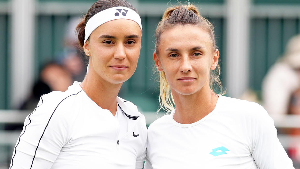 Anhelina Kalinina and Lesia Tsurenko, pictured here posing for a photo before their match at Wimbledon.