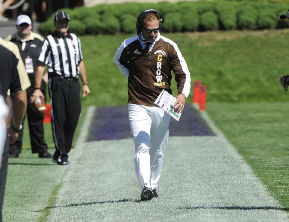 Western Michigan head coach P.J. Fleck walks the sideline during the first quarter of an NCAA college football game against Northwestern in Evanston, Ill., Saturday, Sept. 3, 2016. (AP Photo/Matt Marton)